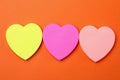 Three blank heart shaped stickers with space for text. Creative symbolic background Royalty Free Stock Photo