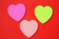 Three blank heart shaped stickers with space for text. Creative symbolic background Royalty Free Stock Photo