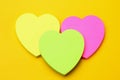 Three blank heart shaped stickers with space for text. Creative symbolic background Royalty Free Stock Photo