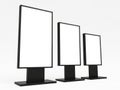 Three blank monitors on stands isolated on white background Royalty Free Stock Photo