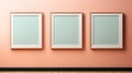 Three blank picture frames on pink wall. Peach Fuzz color. Mock up
