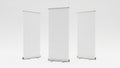 Three blank roll-up banners isolated on white background Royalty Free Stock Photo