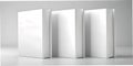 Three blank white books in a row against a light grey backdrop. Minimalist and clean. Suitable for mockups or design templates Royalty Free Stock Photo