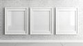 Three blank white frames on a grey brick wall mockup for trendy interior design inspiration Royalty Free Stock Photo