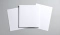 Three Blank White Paper Sheets in a Stacked Arrangement on Gray page Royalty Free Stock Photo