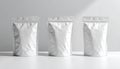 Three Blank White Stand-Up Pouches on White Surface Royalty Free Stock Photo