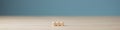 Three blank wooden dices in a row placed on wooden desk Royalty Free Stock Photo