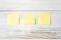 Three Blank Yellow Post It Notes Ready for any Message Royalty Free Stock Photo