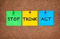 Three blanks post-it notes on corkboard with words Stop, Think, Act Royalty Free Stock Photo