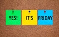 Three blanks post-it notes on corkboard with words Yes! Its Frid Royalty Free Stock Photo