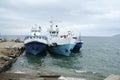 Three blue boats on Lake Baikal