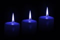 Three blue candles Royalty Free Stock Photo