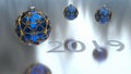 Three blue christmas ball enclosed with gold ornaments. 2019. Royalty Free Stock Photo