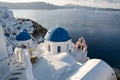 Three Blue Domes church Santorini Oia village in Santorini island, Greece Royalty Free Stock Photo