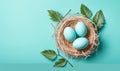 three blue eggs in a nest with green leaves on a blue background with copy space for text or image, top view, flat lay on a green Royalty Free Stock Photo