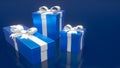 Three blue gift boxes with white ribbons, isolated on blue background