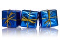 Three blue glossy gift boxes