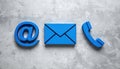 Contact options shows email, letter and phone on gray background Royalty Free Stock Photo
