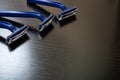 Three blue razors on a wooden background Royalty Free Stock Photo