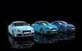 Three Blue Sport Cars