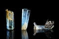 Three blue Tourmaline, Indicolite, black background, healing stone, mineral Royalty Free Stock Photo