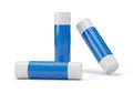 Three blue and white adhesive sticks arranged artistically on a clean white background Royalty Free Stock Photo