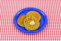 Three blueberry waffles on plate Royalty Free Stock Photo