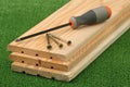 Three boards, screws and screw-driver Royalty Free Stock Photo