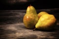 Three bosc pears on gray studio backdrop Royalty Free Stock Photo