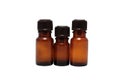 Three bottles of aromatherapy oils isolated close-up Royalty Free Stock Photo