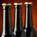 Three bottles of beer over brown background. Royalty Free Stock Photo