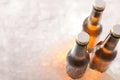 Three bottles of closed beers on crushed ice Royalty Free Stock Photo