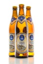 Three bottles cold light lager beer Bavarian Hofbrau Munich brew Royalty Free Stock Photo