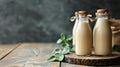 Three Bottles of Milk Hanging on a Wall Royalty Free Stock Photo