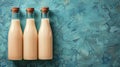 Three Bottles of Milk Hanging on a Wall Royalty Free Stock Photo