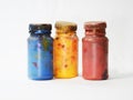 three bottles of screen printing paint with white screen background Royalty Free Stock Photo