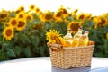 Three bottles of sunflower oil in a wicker basket