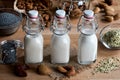 Vegan plant milks - almond milk, poppy seed milk and hemp seed m