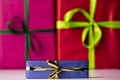 Three bowknots tied around gifts