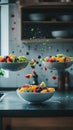 Three bowls of fruit salad hovering over a kitchen table. Royalty Free Stock Photo
