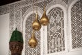 Three brass lamps in a typical palace in Marakesh