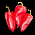 Three bright big red bell peppers with gteen tails on black background top view closeup