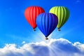 Three bright hot air balloons on the sky, symbol of the RGB color scheme