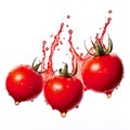 Three bright and ripe colored tomatoes with water dripping around them on a white background