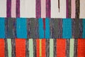 Three bright textile striped rugs with lilac, blue, red and white stripes. Textile texture