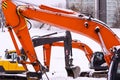 Excavators on a winter building site