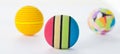 Three Brightly Coloured Foam Balls Isolated.