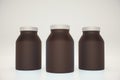 Three brown bottles Royalty Free Stock Photo