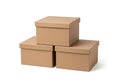 Stack of three brown cardboard boxes on white background Royalty Free Stock Photo