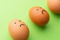 three brown Eggs arranged in carton